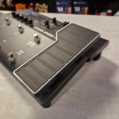 Pre-Owned Line 6 POD Go Guitar effects pedal with footswitch on a gray surface
