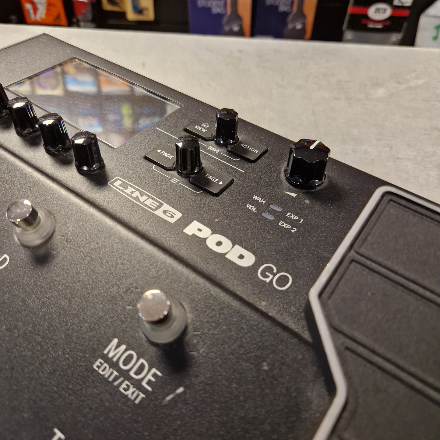 Pre-Owned Line 6 POD Go Close-up of a guitar effects pedal with 'Line 6 Pod Go' branding.
