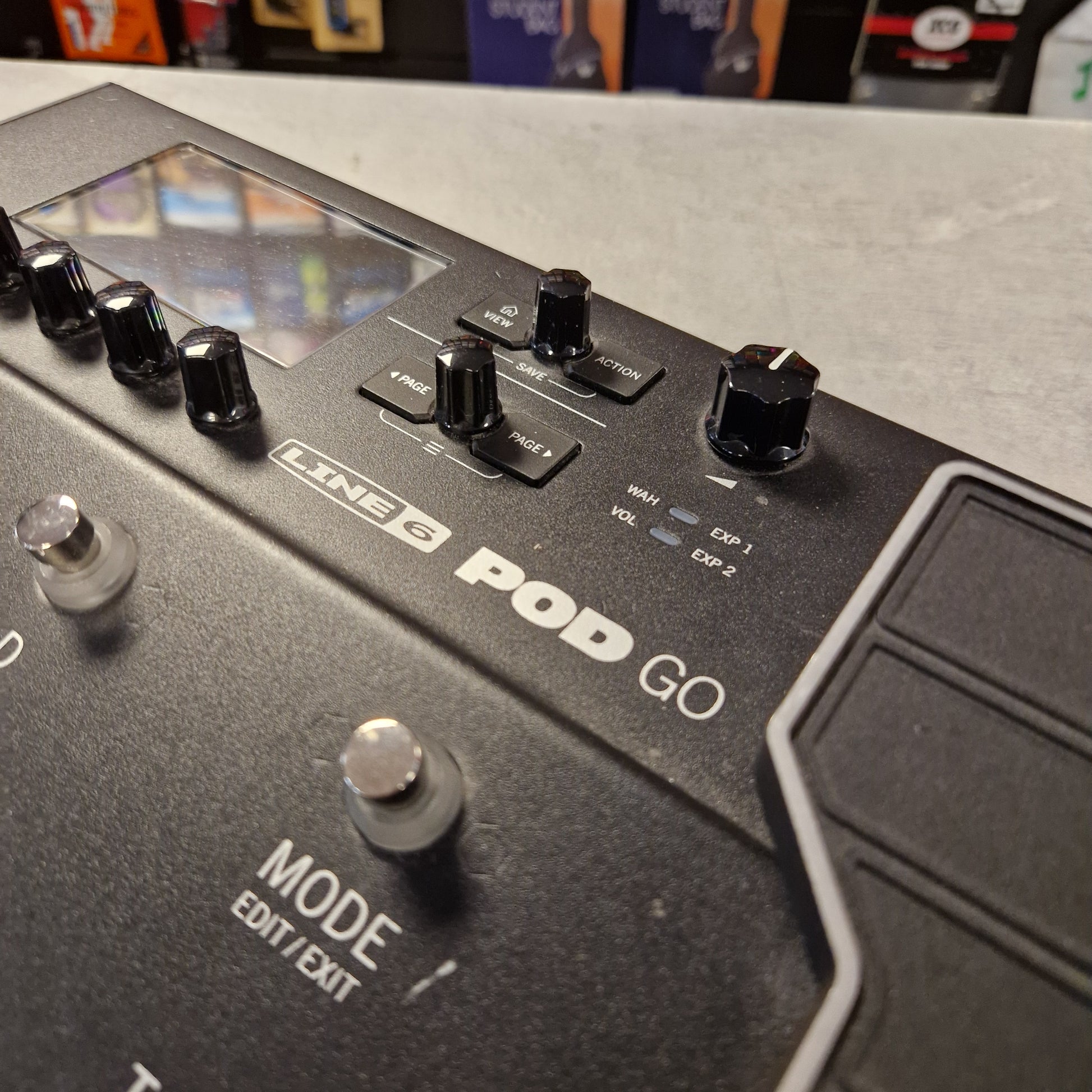 Pre-Owned Line 6 POD Go Close-up of a guitar effects pedal with 'Line 6 Pod Go' branding.