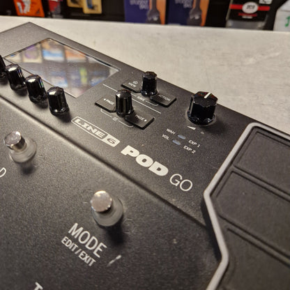 Pre-Owned Line 6 POD Go Close-up of a guitar effects pedal with 'Line 6 Pod Go' branding.