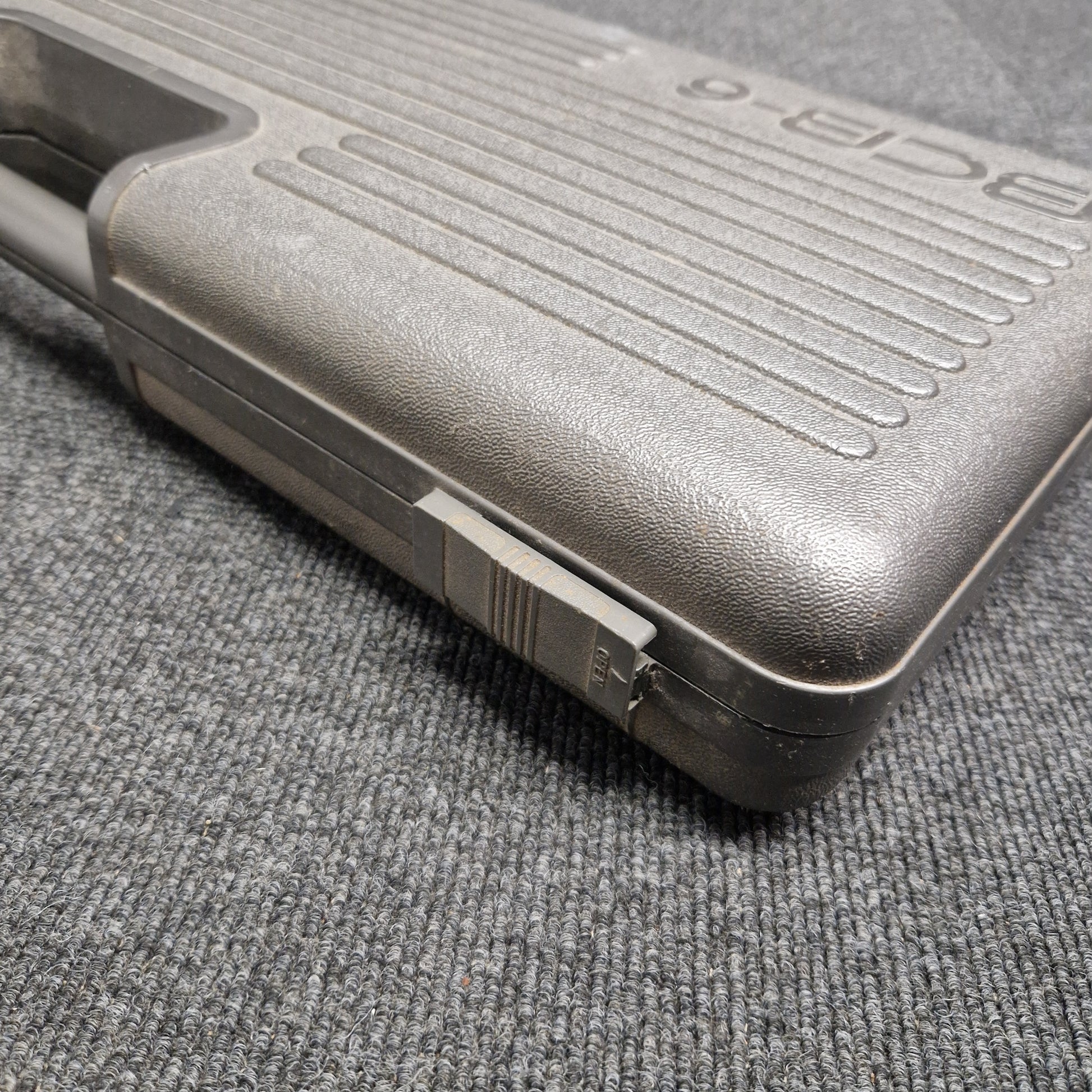 Pre-Owned Boss BCB-6 Metallic object with 'EDGE' branding on a textured gray surface
