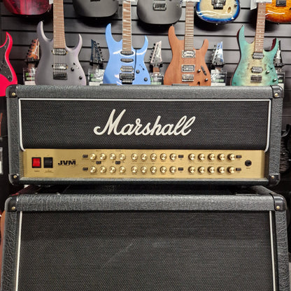 Pre-Owned Marshall JVM410H Marshall guitar amplifier with guitars in the background