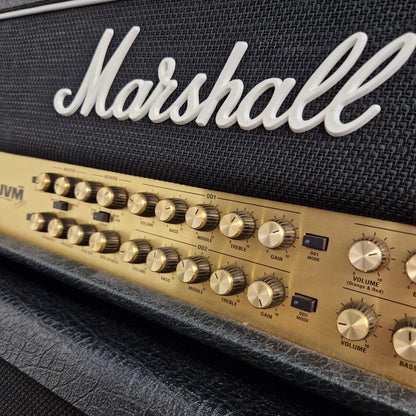 Pre-Owned Marshall JVM410H Marshall amplifier with control knobs on a dark background