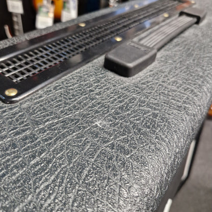 Pre-Owned Marshall JVM410H Close-up of a textured black surface with a metal bracket