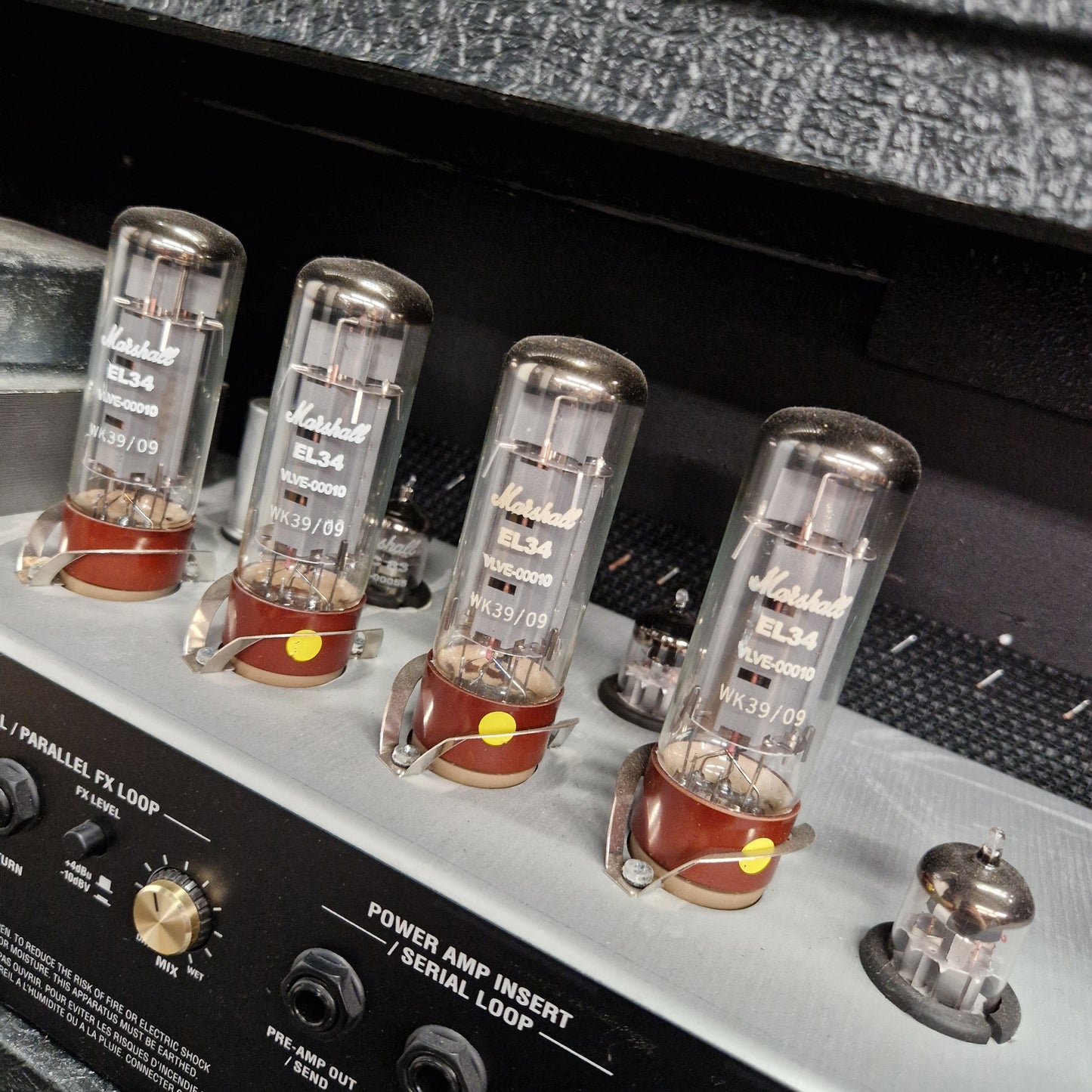 Pre-Owned Marshall JVM410H Vacuum tubes on a vintage amplifier with visible brand labels.