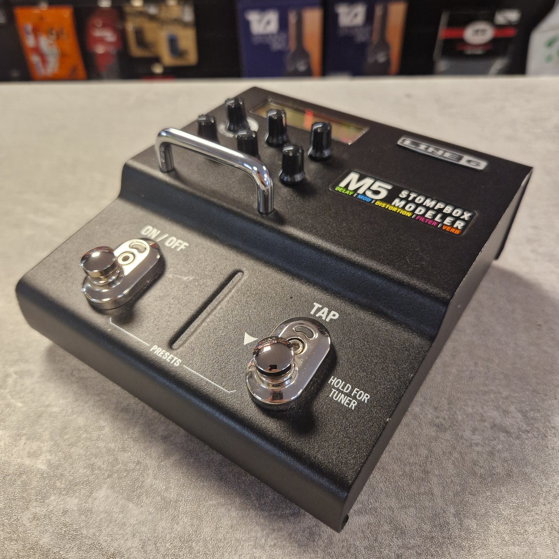 Pre-Owned Line 6 M5 Guitar effects pedal with 'M5' branding on a gray surface