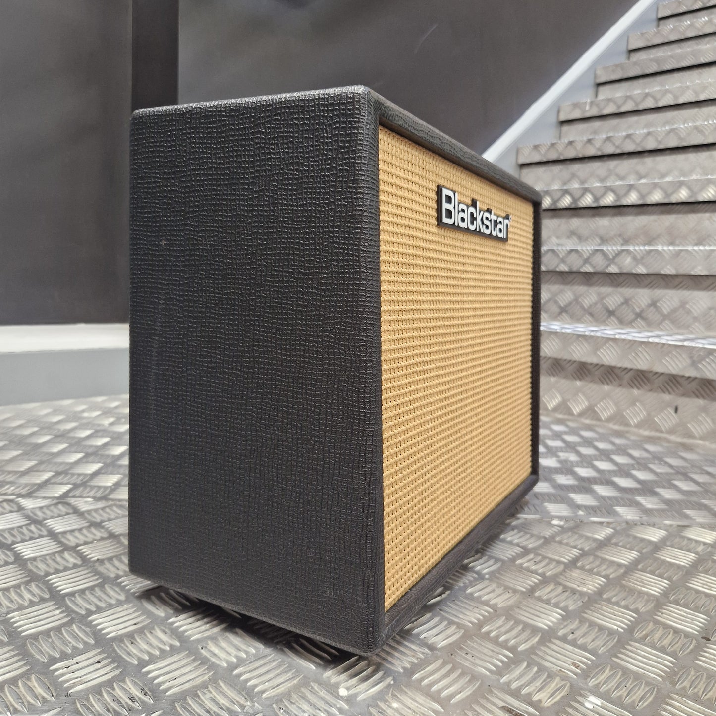 Pre-Owned Blackstar Debut 50R Black and beige speaker on a textured surface