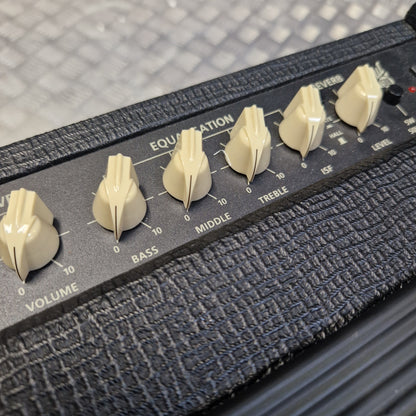 Pre-Owned Blackstar Debut 50R Close-up of an amplifier with control knobs on a textured surface