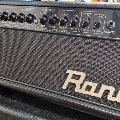 Pre-Owned Randall KH-120 Close-up of a Roland guitar amplifier with control knobs and brand name.