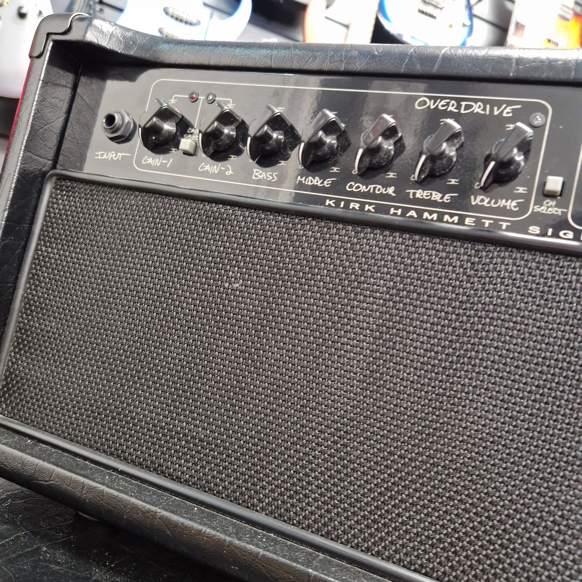 Pre-Owned Randall KH-120 Guitar amplifier with control knobs and branding on a textured surface
