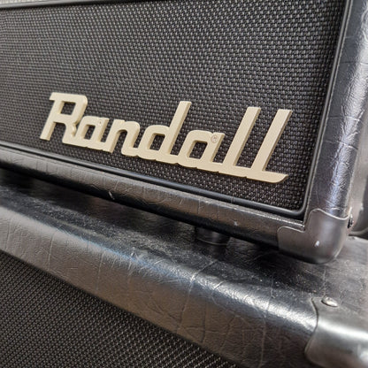 Pre-Owned Randall KH-120 Close-up of a Randall guitar amplifier with brand name.