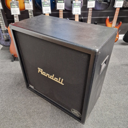 Pre-Owned Randall KH-120 Randall guitar amplifier on display with guitars in the background
