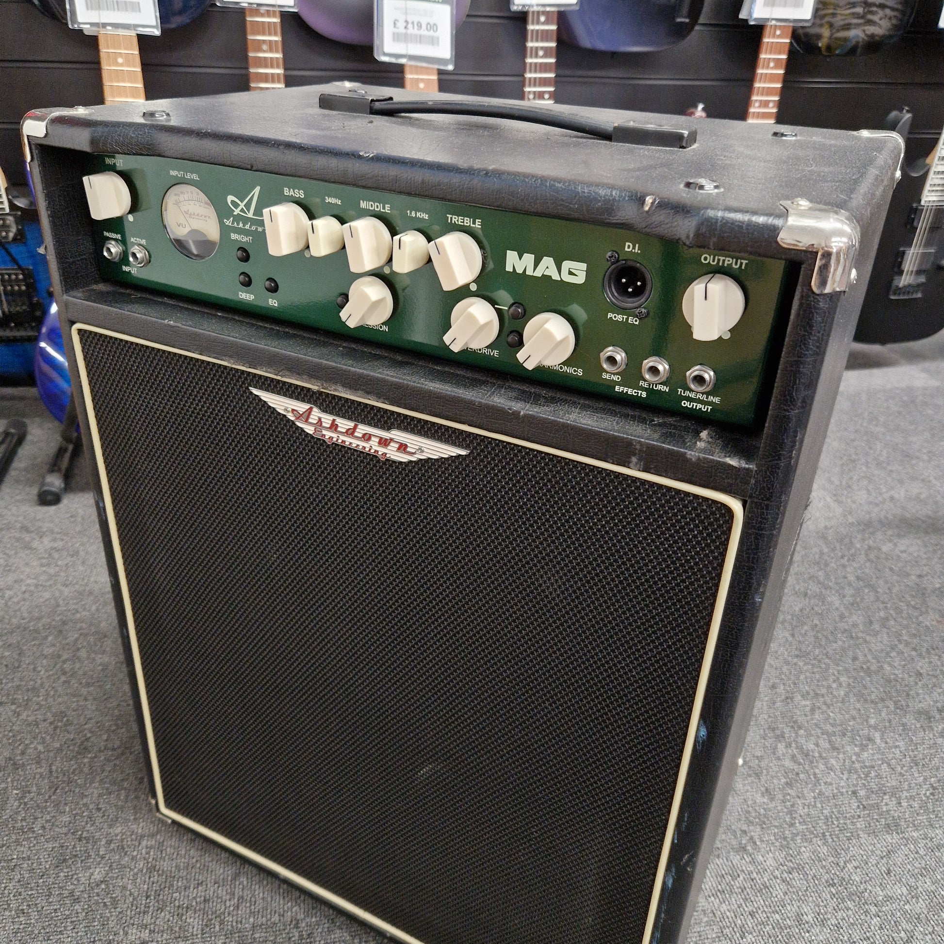 Pre-Owned Ashdown MAG-C210T-300EVO Guitar amplifier with control panel and speaker on a gray surface