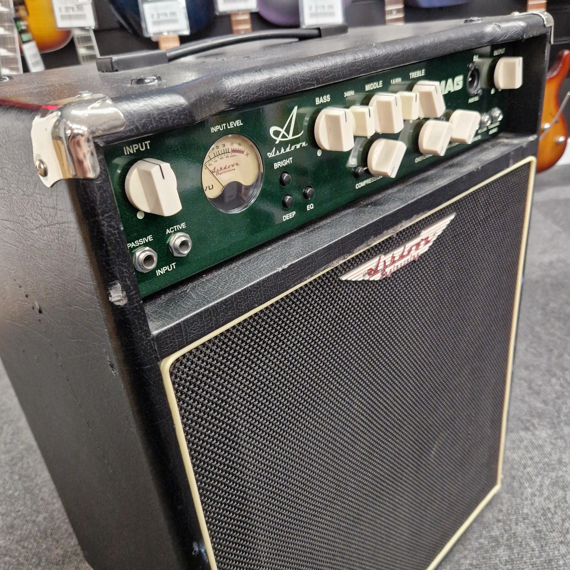 Pre-Owned Ashdown MAG-C210T-300EVO Guitar amplifier with visible brand logo on a gray surface
