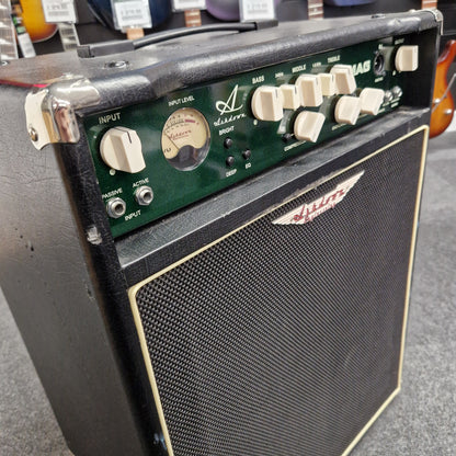 Pre-Owned Ashdown MAG-C210T-300EVO Guitar amplifier with visible brand logo on a gray surface