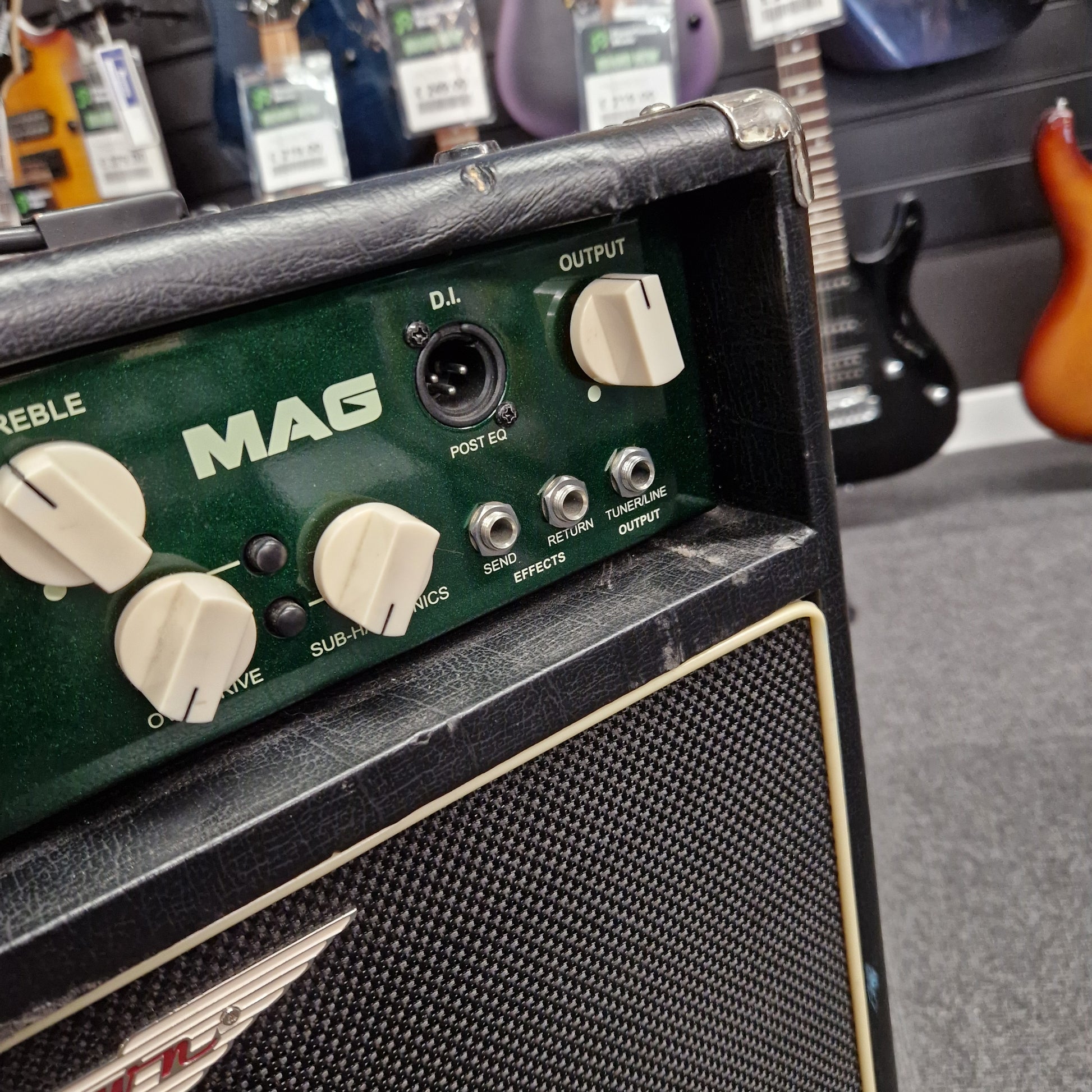 Pre-Owned Ashdown MAG-C210T-300EVO Guitar effects pedal with 'MAG' branding on a guitar amplifier.