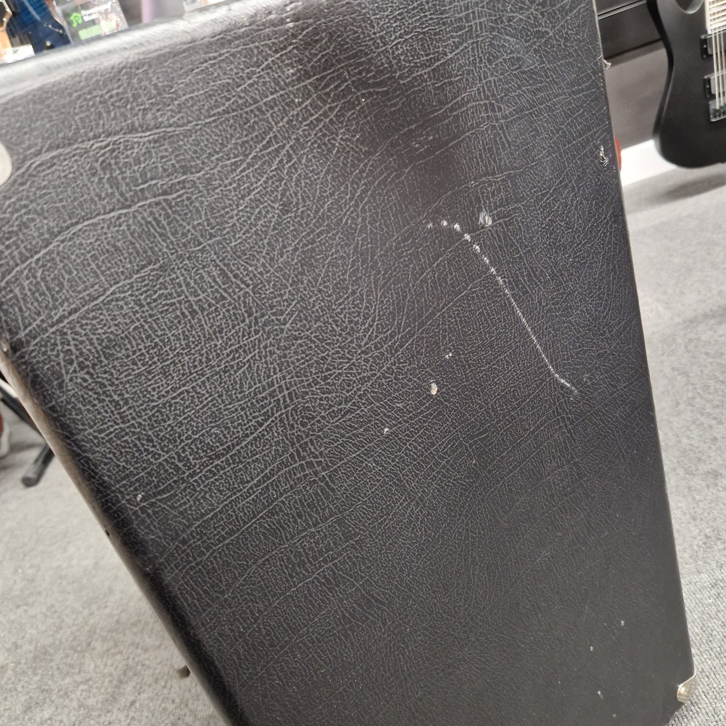 Pre-Owned Ashdown MAG-C210T-300EVO Black textured surface with visible wear and tear