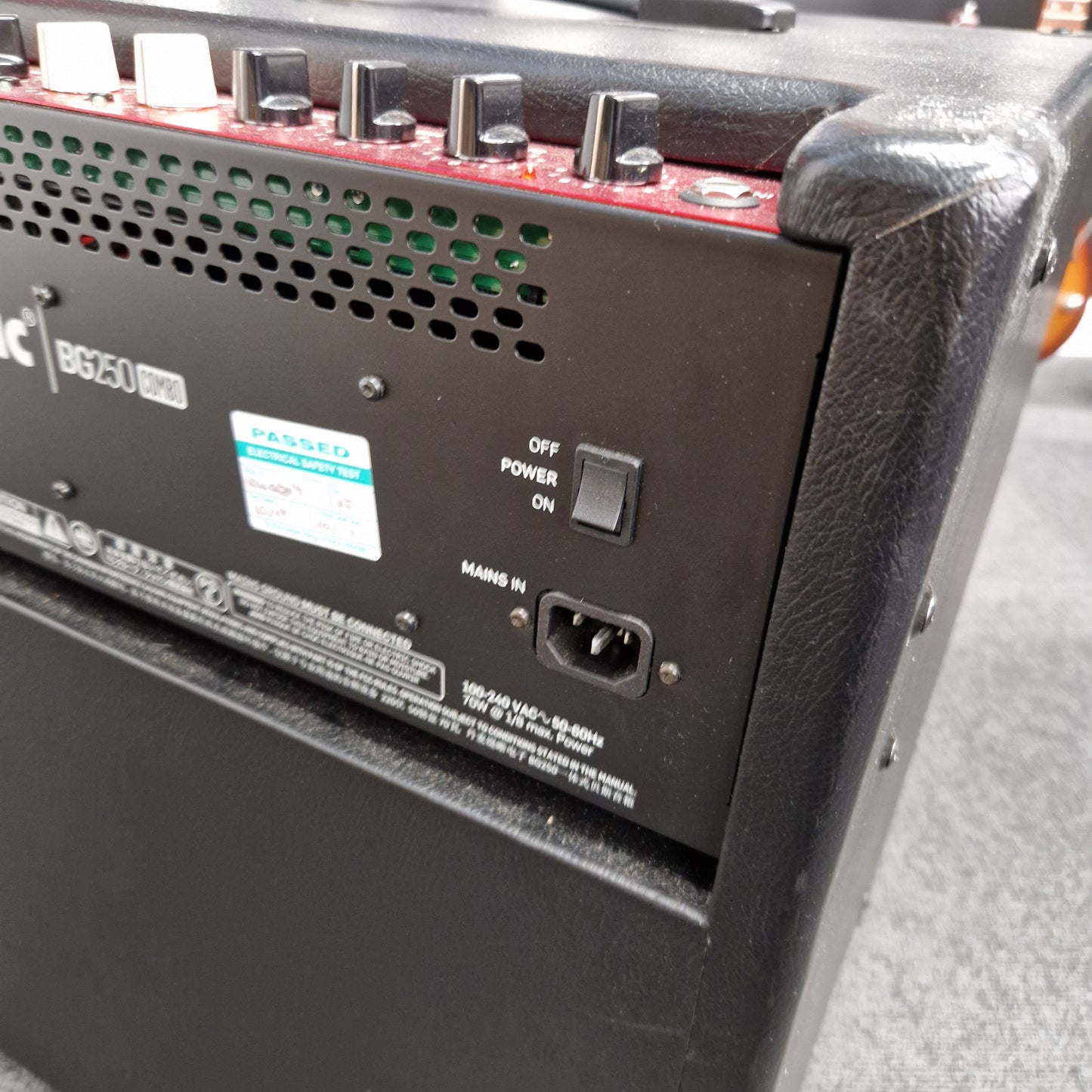Pre-Owned TC Electronic BG250-112 Back panel of a piece of electronic equipment with power switch and connectors.