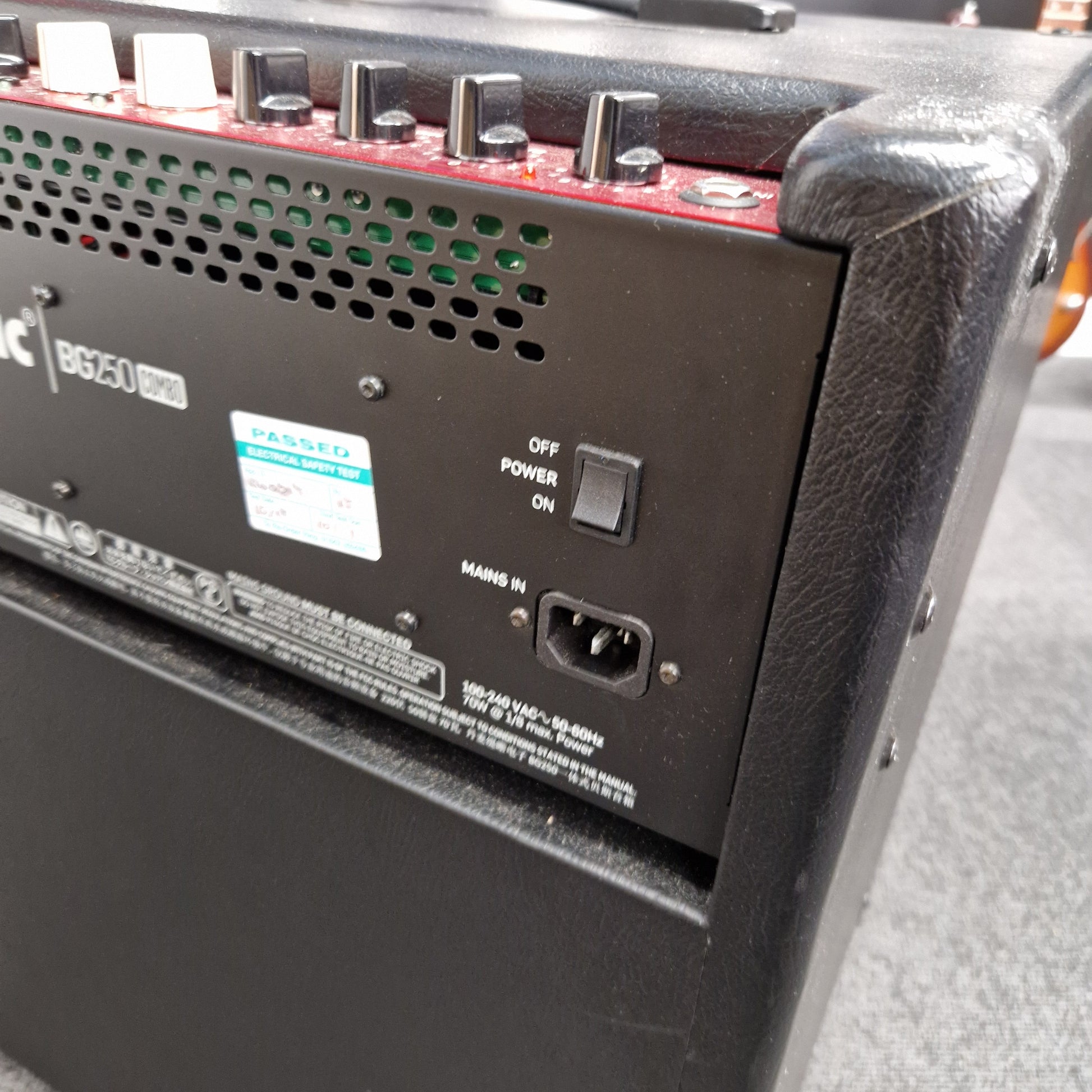 Pre-Owned TC Electronic BG250-112 Back panel of a piece of electronic equipment with power switch and connectors.