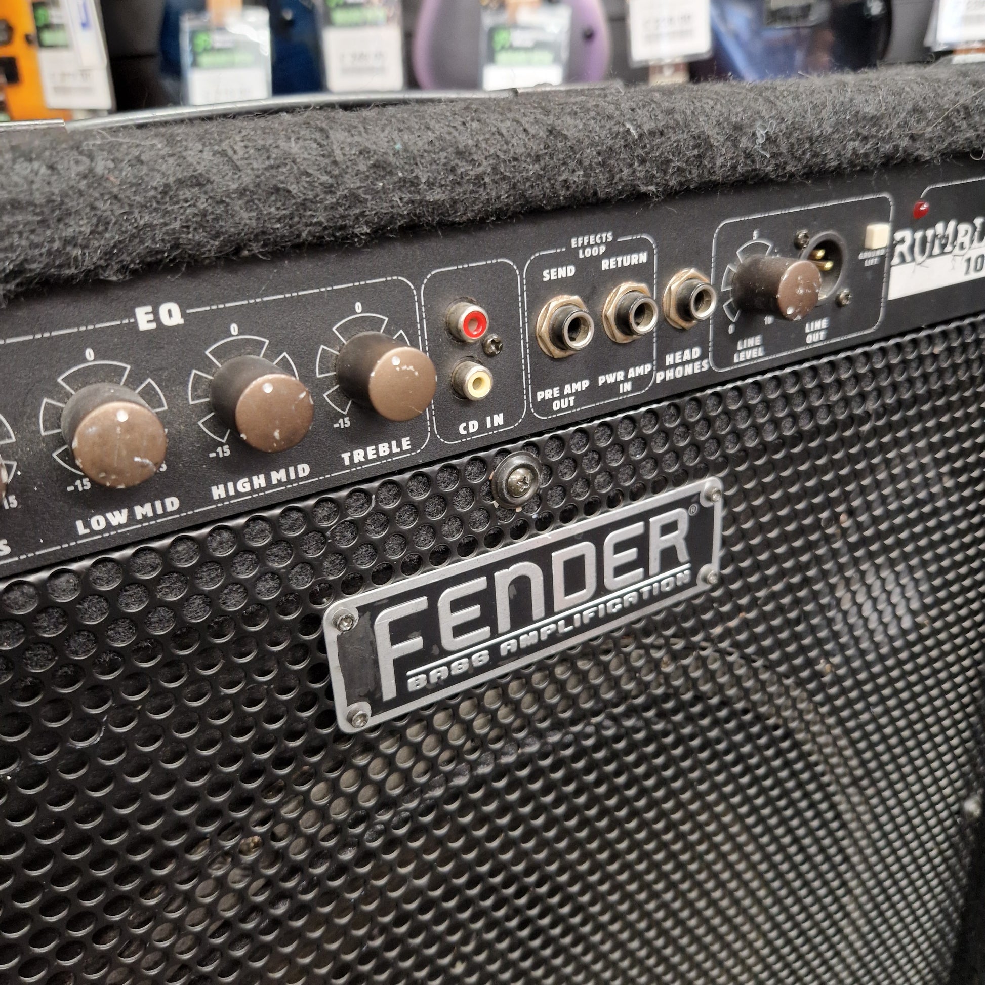 Pre-Owned Fender Rumble 100 Fender amplifier with control panel and branding