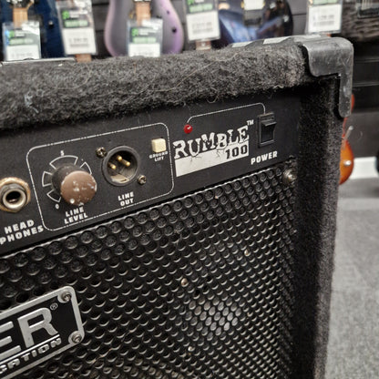 Pre-Owned Fender Rumble 100 Close-up of a Rumble 100 amplifier with control panel details.