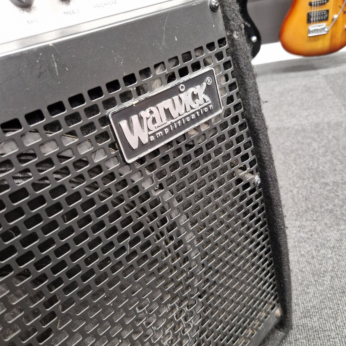 Pre-Owned Warwick BC300 Guitar amplifier with 'Wampler' branding on a textured surface