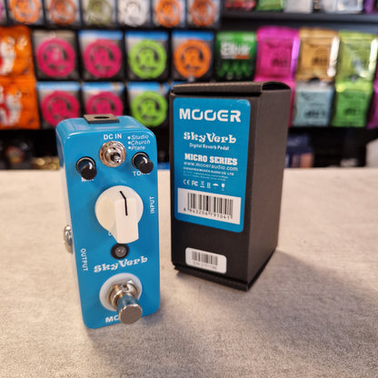 Pre-Owned Mooer MRV2 Guitar effect pedal with 'Mooer' branding on a textured surface.