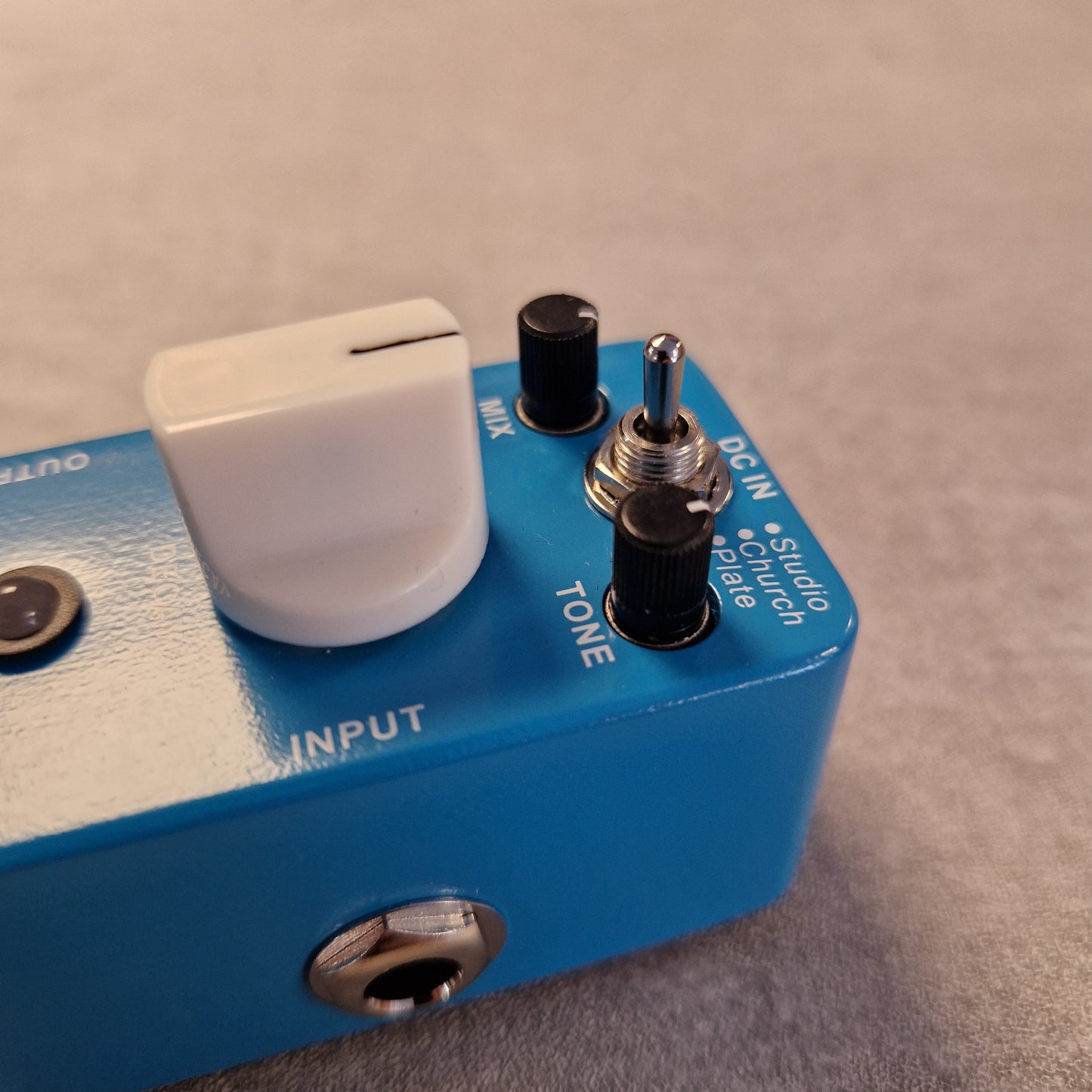 Pre-Owned Mooer MRV2 Blue audio effects pedal with switches and a control knob on a neutral background