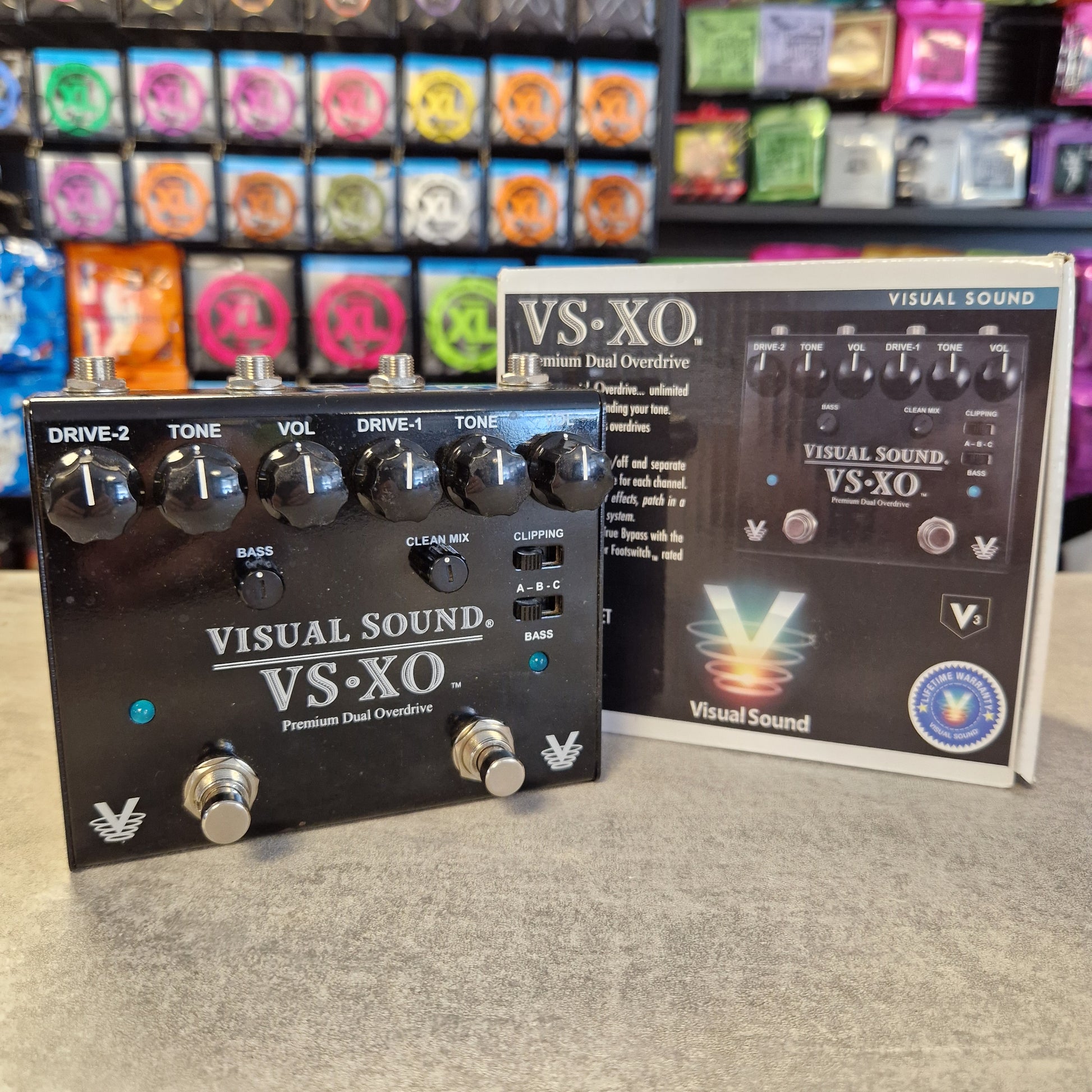 Pre-Owned Truetone VSXO Guitar effects pedal with 'Visual Sound VS:XO' branding on a gray surface.