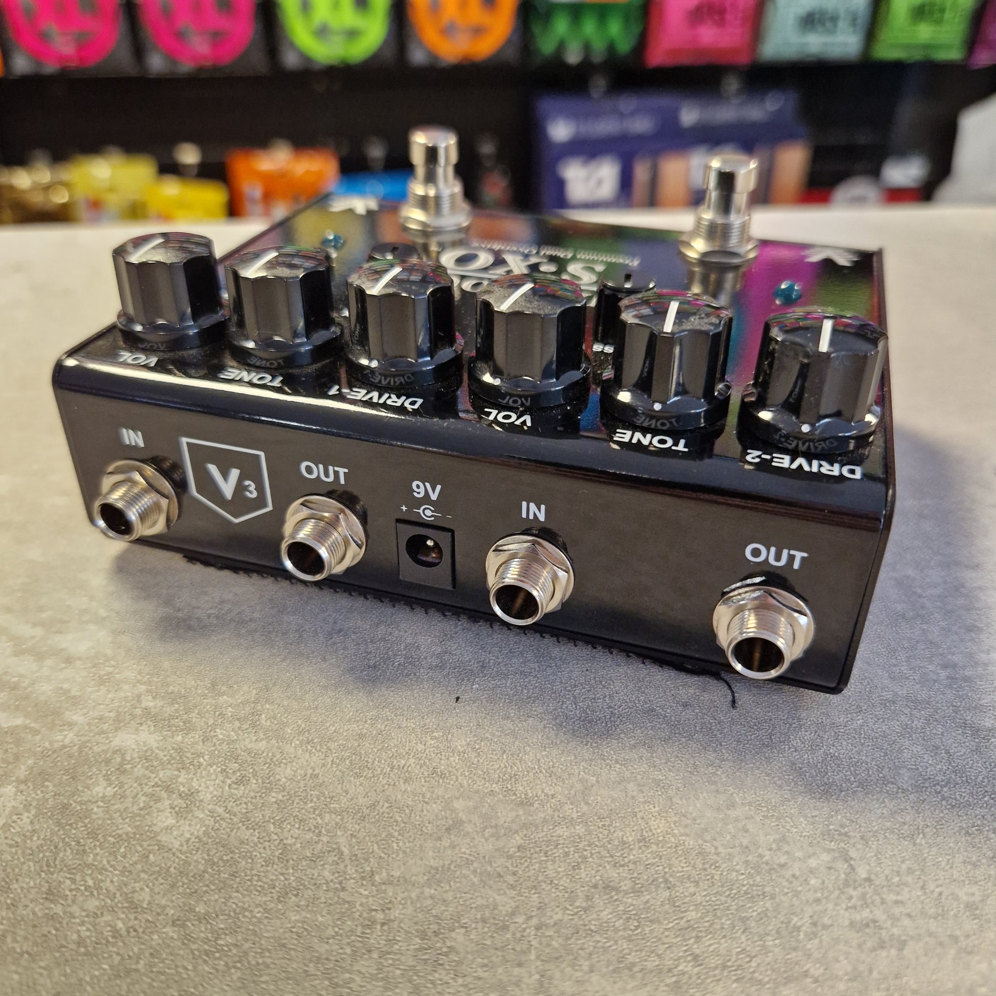 Pre-Owned Truetone VSXO Guitar effects pedal with multiple knobs and connectors on a textured surface.