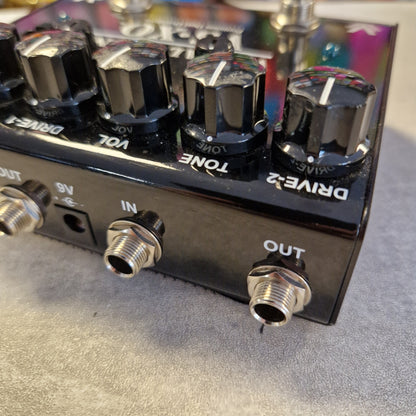 Pre-Owned Truetone VSXO Guitar effects pedal with control knobs and jacks on a textured surface
