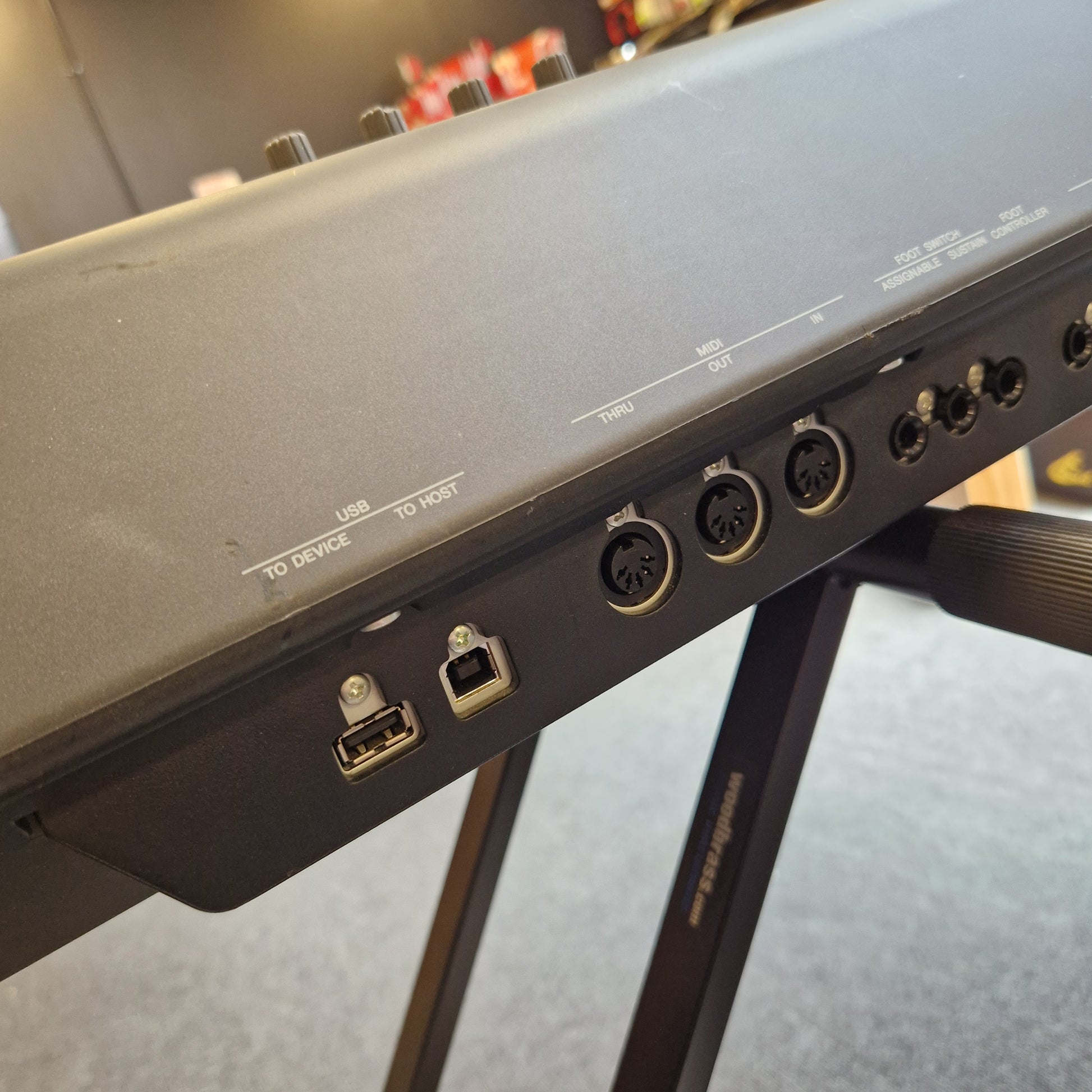 Pre-Owned Yamaha MOXF8 Back view of a piece of electronic equipment with ports and branding visible.