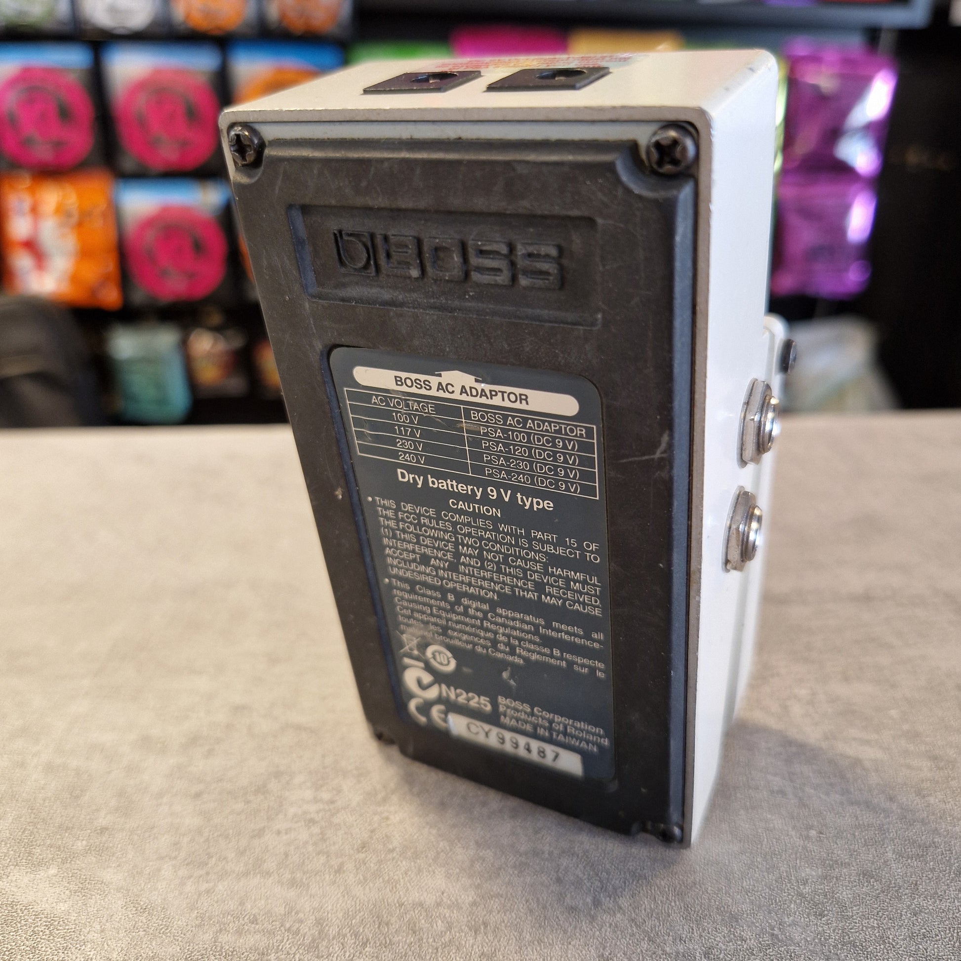 Pre-Owned Boss TU-3 Tuner Pedal A Digigi Bass guitar pedal shown from the back, featuring a white top casing, two silver footswitches, and a black backplate with technical specifications printed on a label.