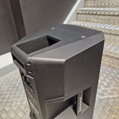 Pre-Owned Headrush FRFR-112 Full Range Powered 1x12 Speaker A black Festoon portable speaker shown from an angled top-down view, resting on a diamond plate metal staircase.