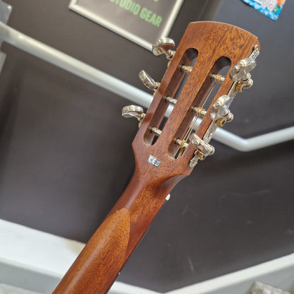 Pre-Owned Layke Smokestack Parlour Electro-Acoustic - Mahogany Close-up of the headstock of a wooden acoustic guitar, showing the six tuning pegs and wood grain on a dark display background.
