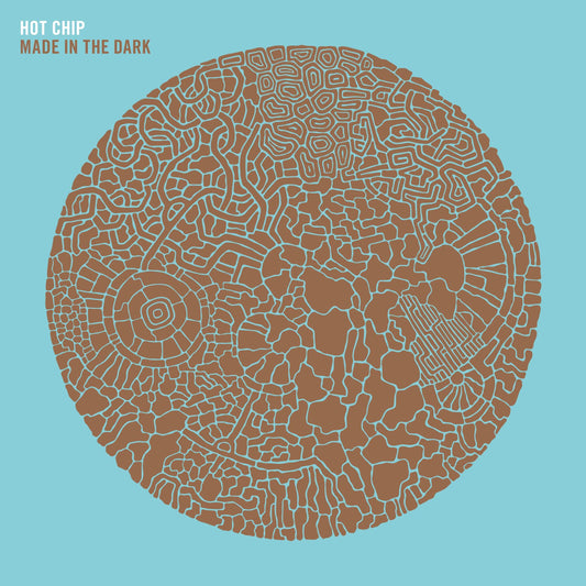 Hot Chip - Made In The Dark Album cover with intricate brown pattern on a light blue background, featuring the text 'Hot Chip Made in the Dark'.