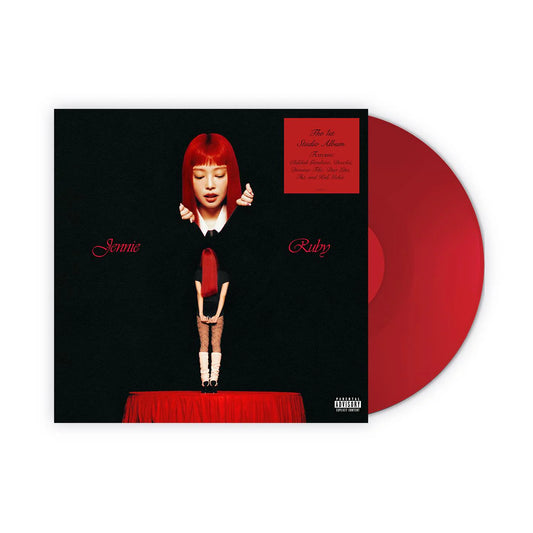 Vinyl record with a black cover featuring a red-haired figure and a red disc. Jennie Ruby