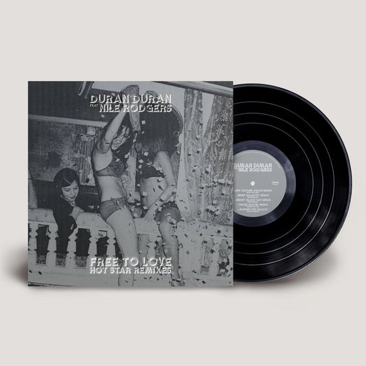 Duran Duran - Free to Love: Hot Star Remixes Vinyl Vinyl record album with the jacket cover and a black LP disc partially visible, shown on a plain light beige background. The cover text reads 'Duran Duran' and 'Free To Love Hot Star Remixer.