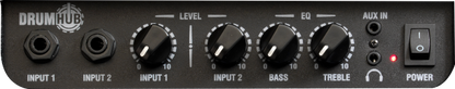 Close-up of the Drum Hub control panel featuring input levels, EQ, and power switch.