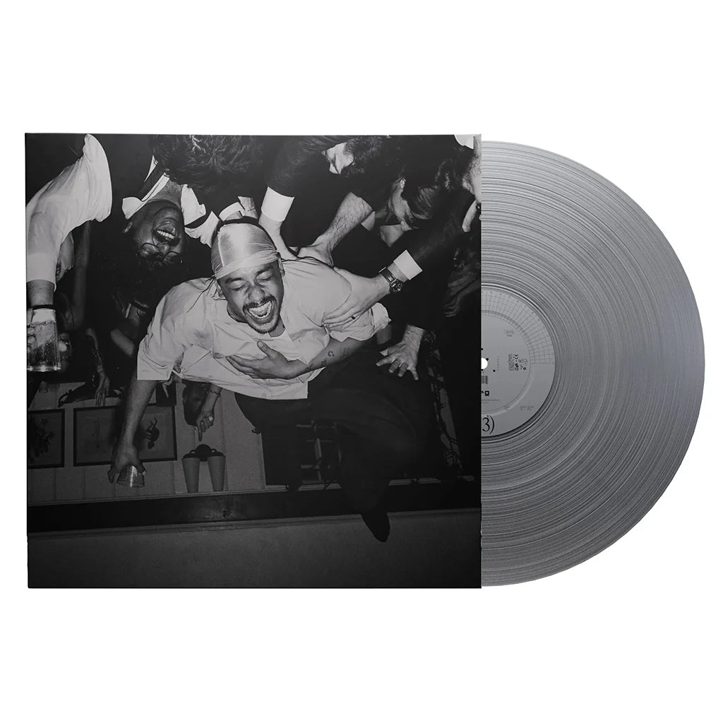 Dijon - Baby Vinyl record with a black and white photo of a man dancing on the cover