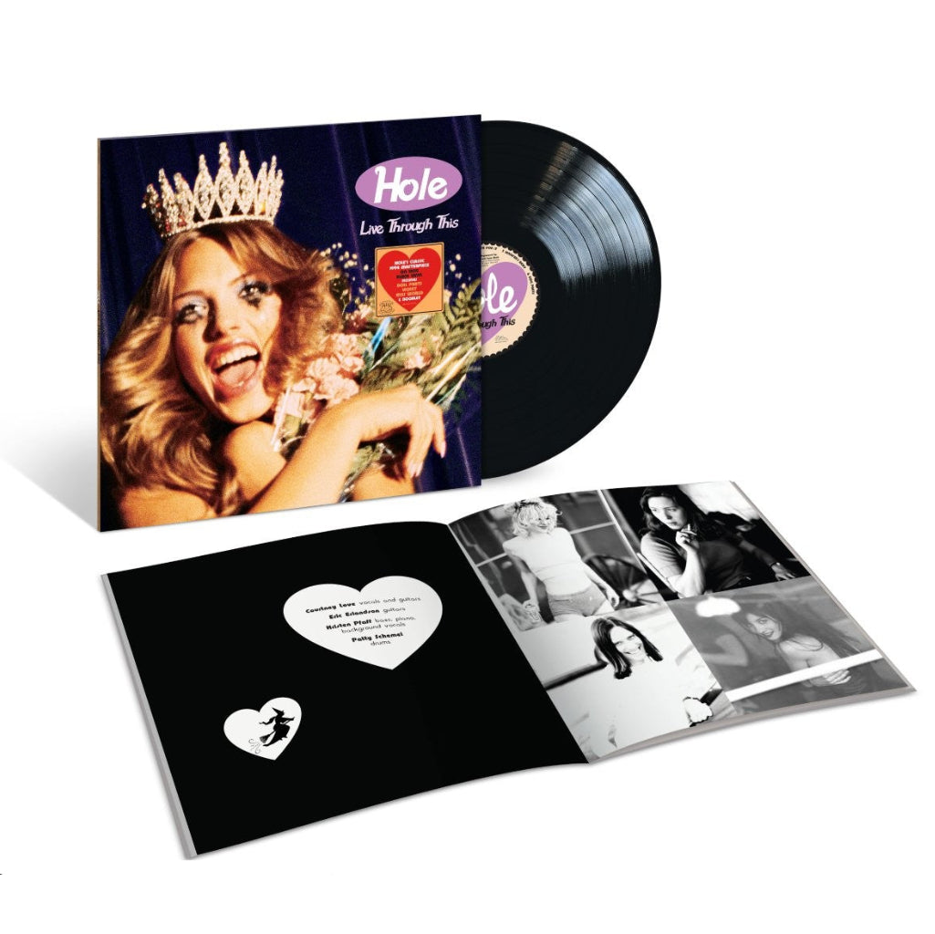 Hole - Live Through This Vinyl Hole - Live Bough This vinyl record album shown with the black LP partially pulled from the sleeve, plus the open inner jacket displaying printed photos and a heart-shaped cutout on a white background.
