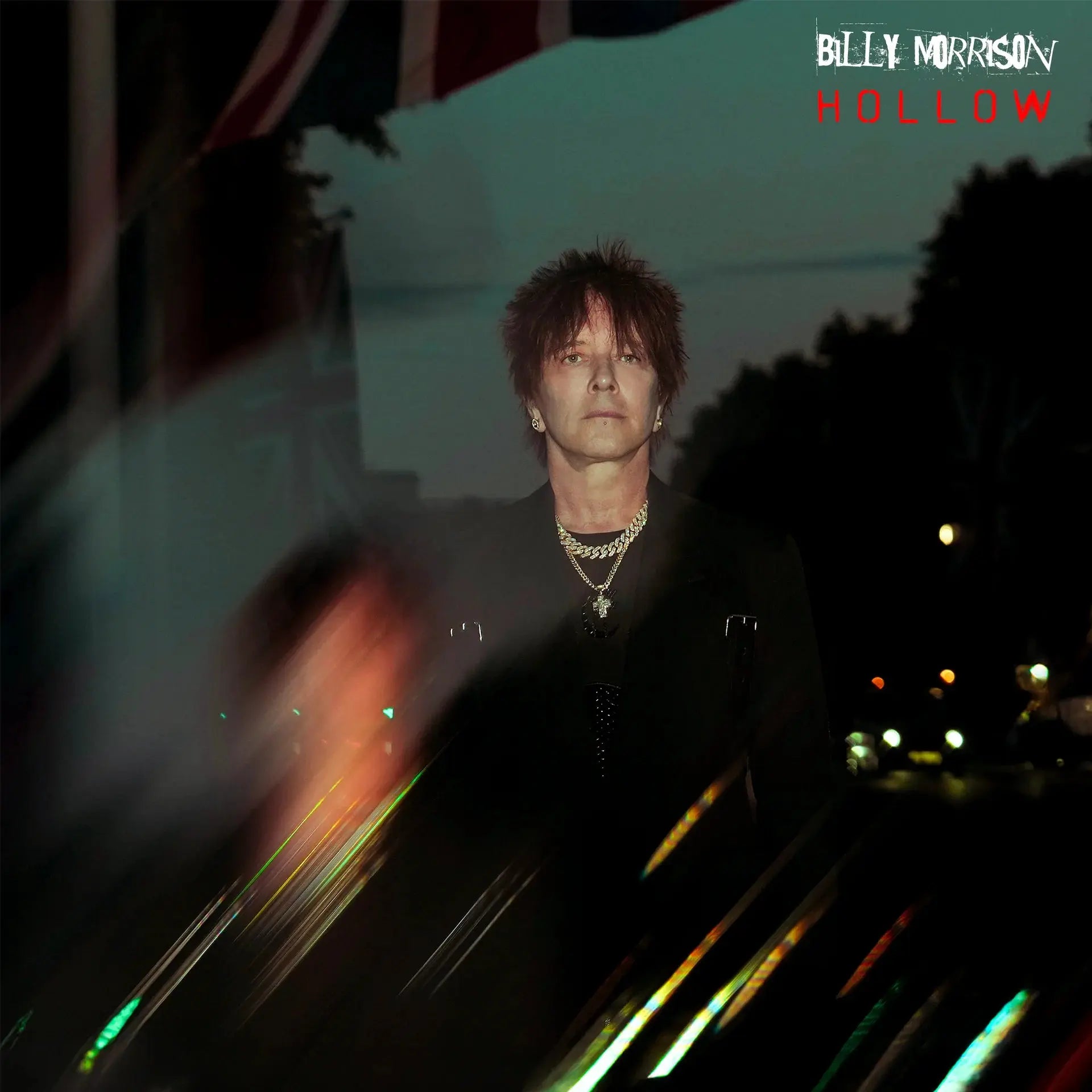 Billy Morrison - HOLLOW (Multicolour) Vinyl Album cover with a person in front of a blurred vehicle at night, featuring the text 'Billy Morrison Hollow'.