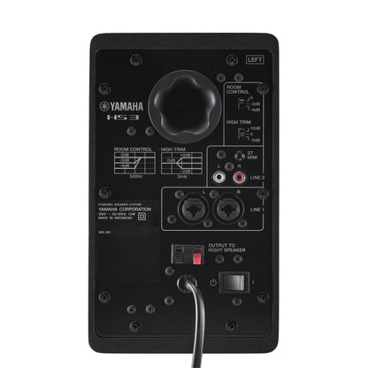 Back view of a Yamaha HS3 speaker with control knobs and connectors on a white background