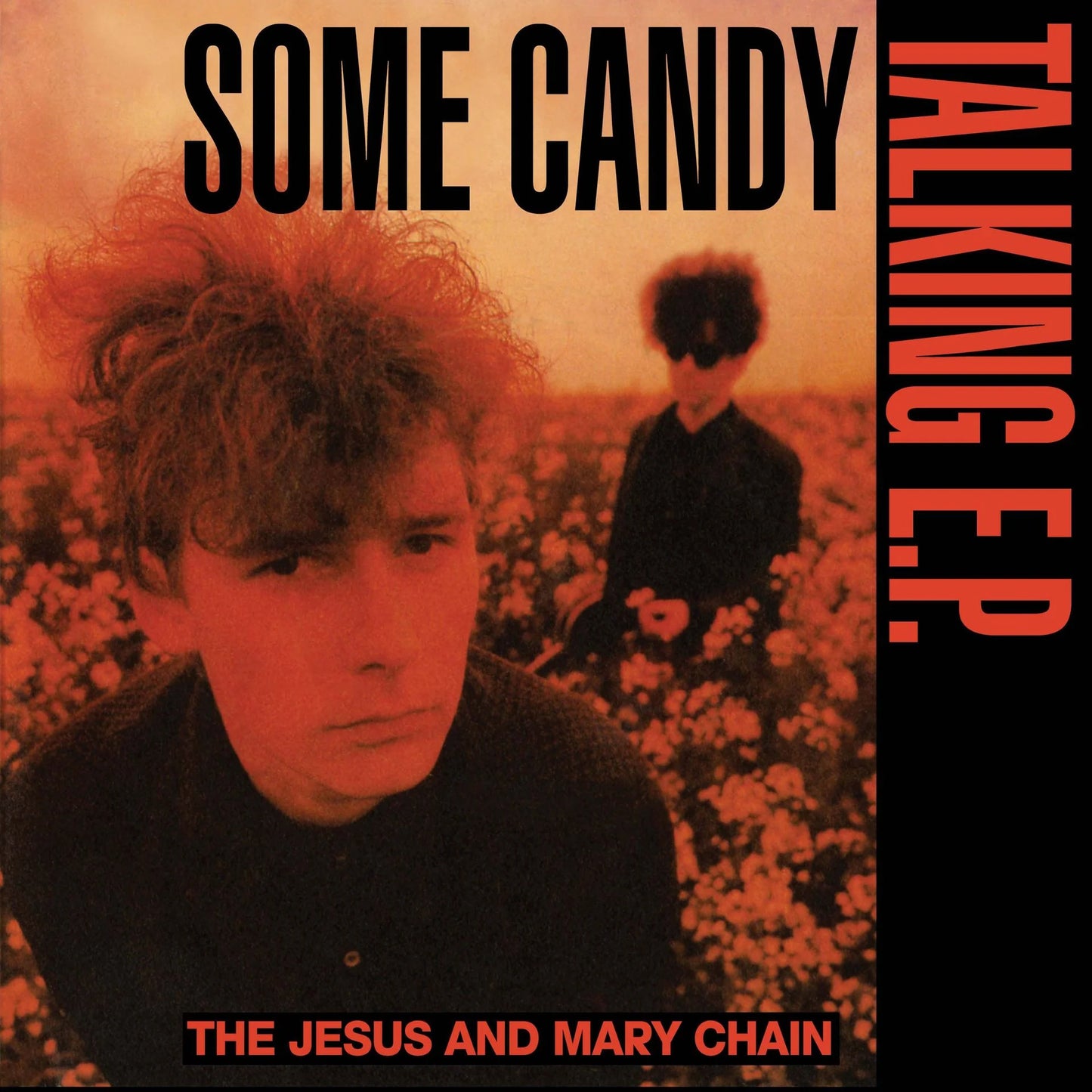 The Jesus and Mary Chain - Some Candy Talking (40th Anniversary Red) Vinyl RSD26 Album cover for 'Some Candy Talking E.P.' by The Jesus and Mary Chain with two people in a field.