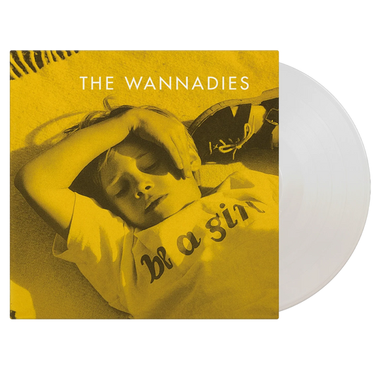 The Wannadies - Be A Girl Vinyl record with yellow cover featuring a person and text, on a white background