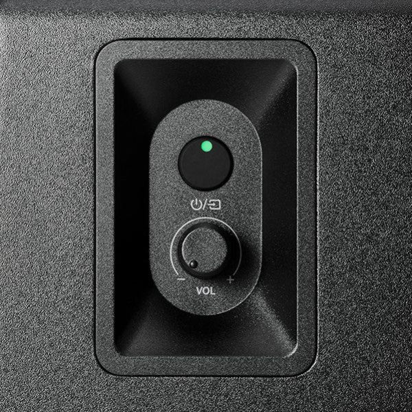 Audio-Technica AT-SP3X Control panel with power and volume knobs on a black surface