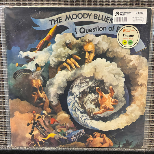 The Moody Blues - A Question Of Balance Vinyl record cover for 'The Moody Blues Question of Time' with artistic design and text.