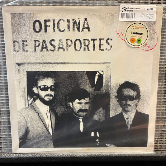 Genesis - Illegal Alien Vinyl record cover with 'Oficina de Pasaportes' text and black and white photo of three men.