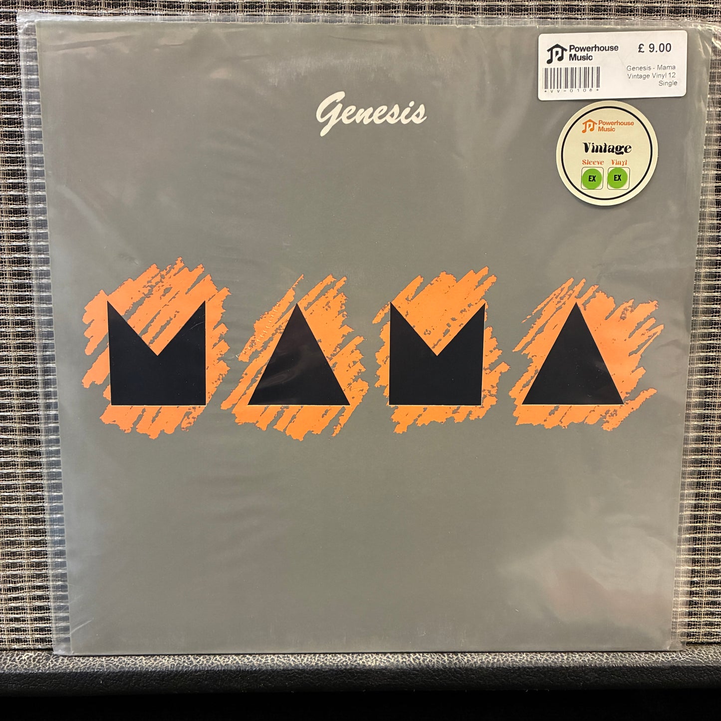 Genesis - Mama Vinyl record cover with orange and black triangle design and 'Genesis' branding.