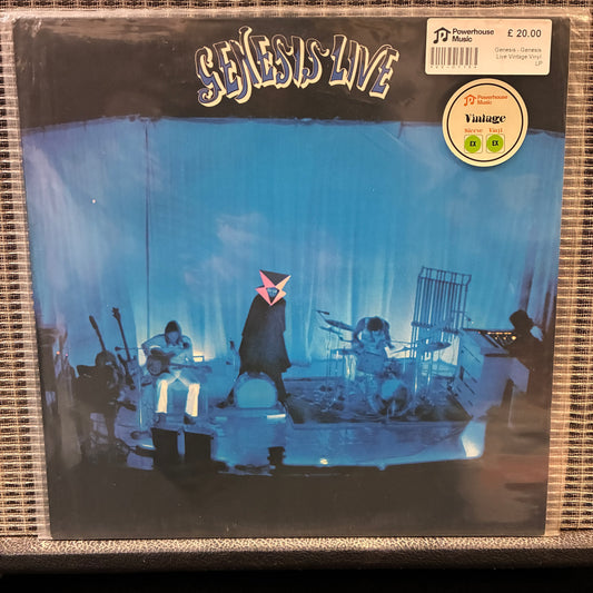 Genesis - Genesis Live Vinyl record cover for 'Genesis Live' with a band on stage.